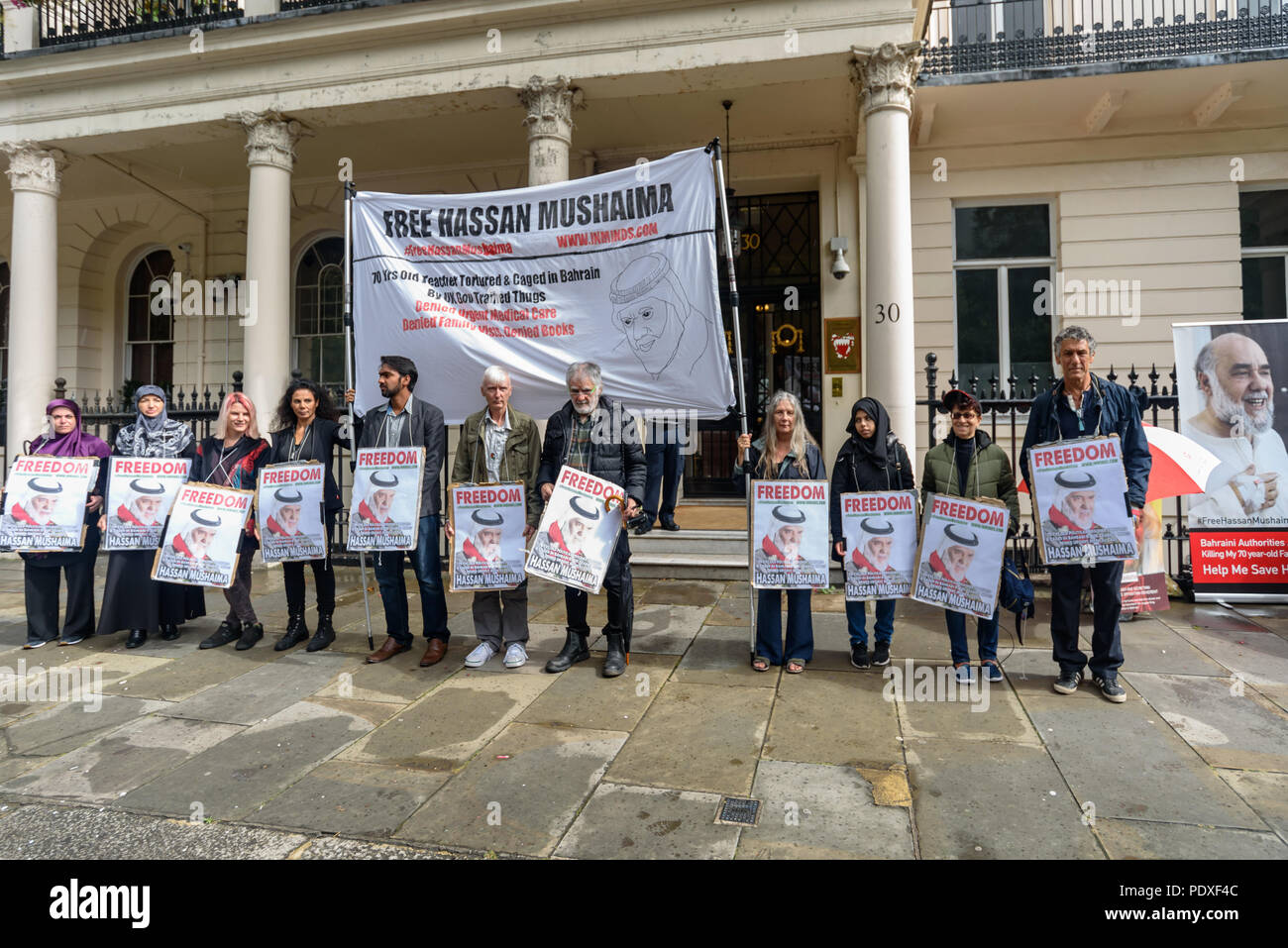 London, UK. 10th August 2018. A vigil by Inminds Islamic human rights organisation outside the Bahrain embassy calls for the immediate release of Hassan Mushaima and all the other 5000 Bahraini prisoners of conscience languishing in the Al-Khalifa regimes jails. Credit: Peter Marshall/Alamy Live News Stock Photo