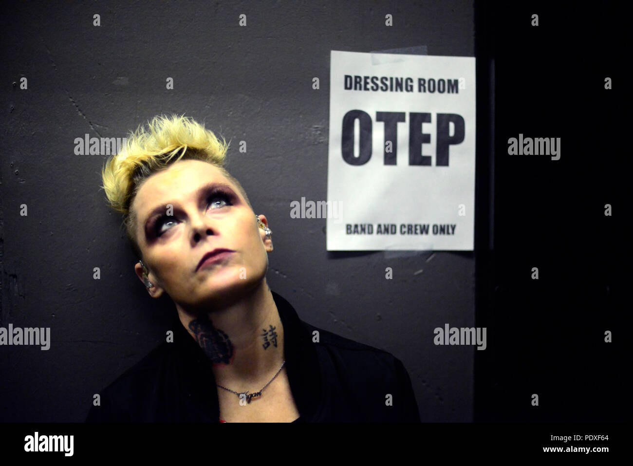West Hollywood, CA, USA. 8th Aug, 2018. Musician - OTEP SHAMAYA lead vocals for OTEP back stage at The Whisky A Go Go, West Hollywood, California, USA, August 8, 2018. OTEP is a Los Angeles based heavy metal band that integrates rap metal, new metal, alternative metal into their sound. OTEP is an anagram for poet. Otep Shamaya descibes the bands sound as, ''art house nu-metal.'' .Image Credit cr Scott Mitchell/ZUMA Press Credit: Scott Mitchell/ZUMA Wire/Alamy Live News Stock Photo