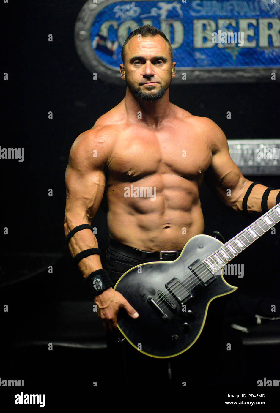 August 8, 2018 - West Hollywood, CA, USA - Musician - ARI MIHAOPOULOS ''ARISTOTLE'' guitars for OTEP, back stage at The Whisky A Go Go, West Hollywood, California, USA, August 8, 2018. OTEP is a Los Angeles based heavy metal band that integrates rap metal, new metal, alternative metal into their sound.  OTEP is an anagram for poet.  Otep Shamaya descibes the bands sound as, ''art house nu-metal.''  ..Image Credit  cr  Scott Mitchell/ZUMA Press (Credit Image: © Scott Mitchell via ZUMA Wire) Stock Photo
