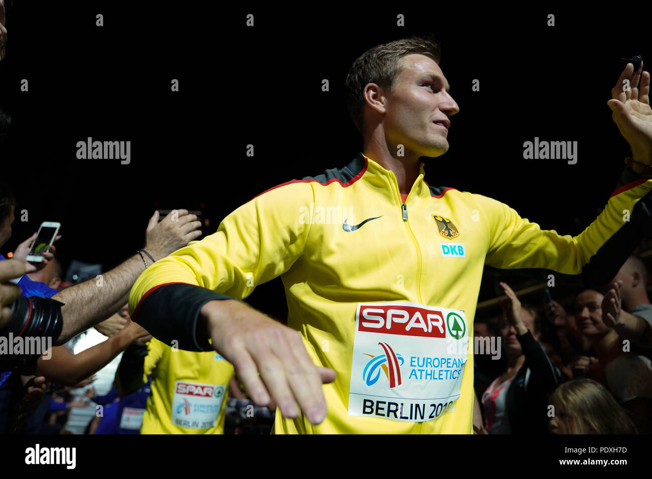 Berlin, Germany, 10 Aug 2018. Thomas Röhler (Germany) greets fans in the medal plaza during the medal ceremony for Mens Javelin at the European Athletics Championships in Berlin, Germany. Credit: Ben Booth Photography Credit: Ben Booth/Alamy Live News Stock Photo