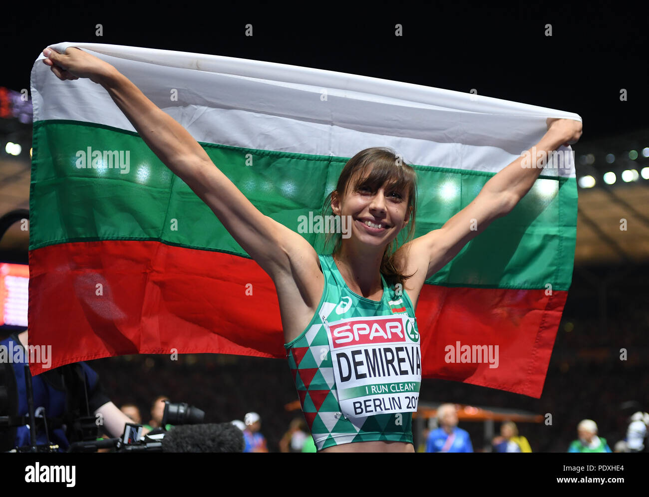 Berlin, Germany. 10th Aug, 2018. Athletics, European Championships in the Olympic Stadium, High Jump, Women, Final. Silver medallist Mirela Demireva from Bulgaria celebrates with her national flag Credit: Action Plus Sports/Alamy Live News Stock Photo