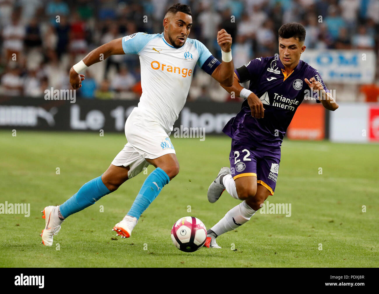 Marseille. 10th Aug, 2018. Dimitri Payet (L) of Marseille vies with Manu  Garcia of Toulouse during the French Ligue 1 football match 2018-19 season  1st round in Marseille, France on Aug. 10,