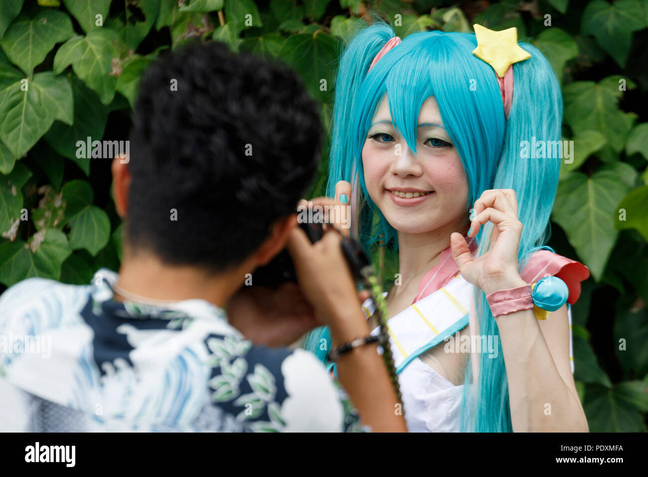 Tokyo, Japan, 11 Aug 2018. A cosplayer poses for a photographer during ...