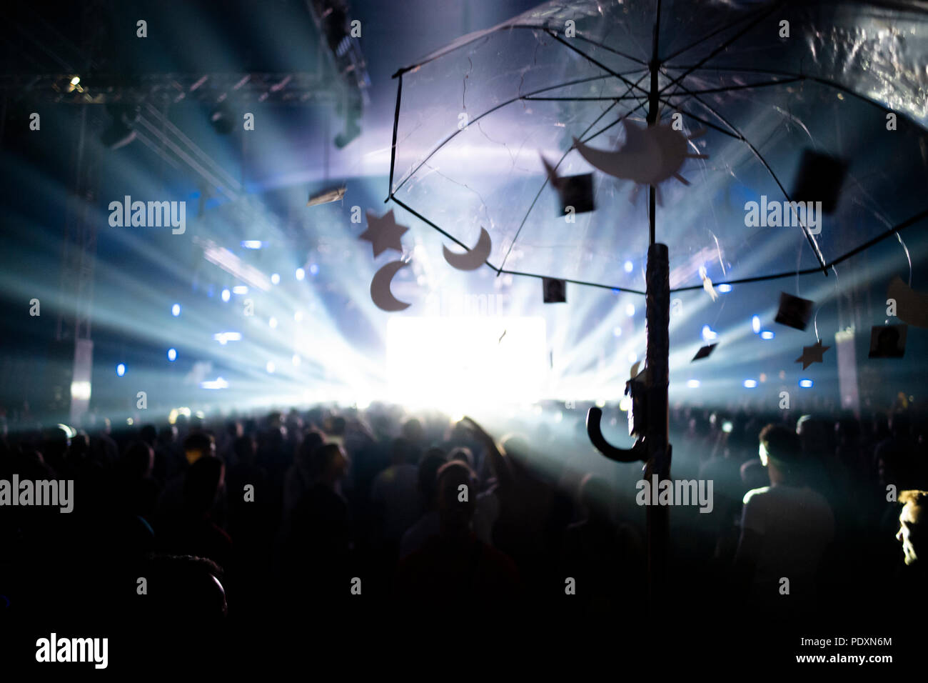SaalburgEbersburg, Germany. 10th Aug, 2018. An umbrella with sun, moon and stars hangs at the