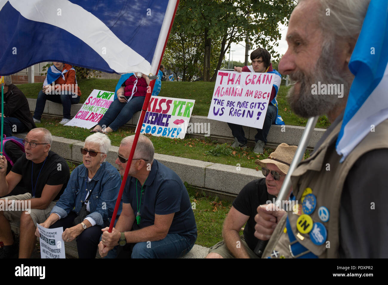 Glasgow, Scotland, on 11 August 2018. Pro-Scottish independence supporters protest against a perceived bias of the BBC against Scotland and the pro-Scottish indpendence movement. Approximately 300 people took part in the protest outside the BBC at Pacific Quay, in Glasgow, Scotland. Image credit: Jeremy Sutton-Hibbert/ Alamy News. Stock Photo