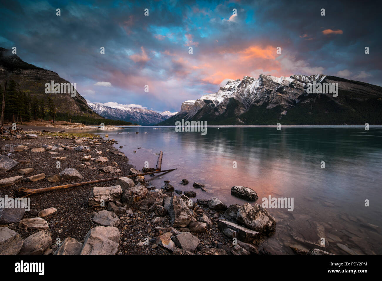 Sunset at Lake Minnewanka, Mountains with Snow, Banff, Banff National Park, Rocky Mountains, Alberta, Canada Stock Photo