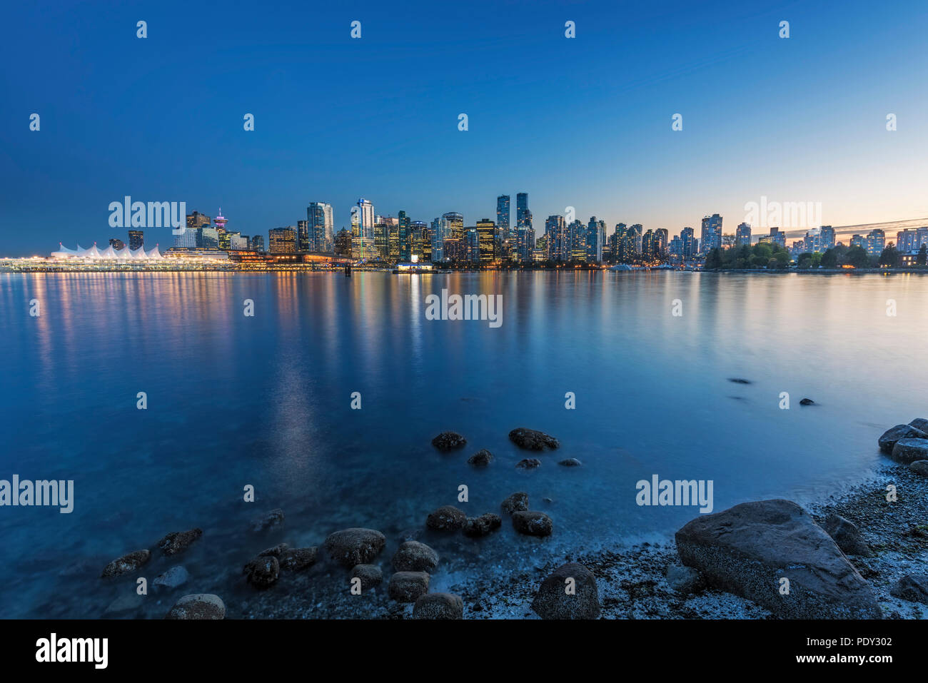 Skyline, skyscraper with Canada Place at night, view from Stanley Park, Vancouver, British Columbia, Canada Stock Photo