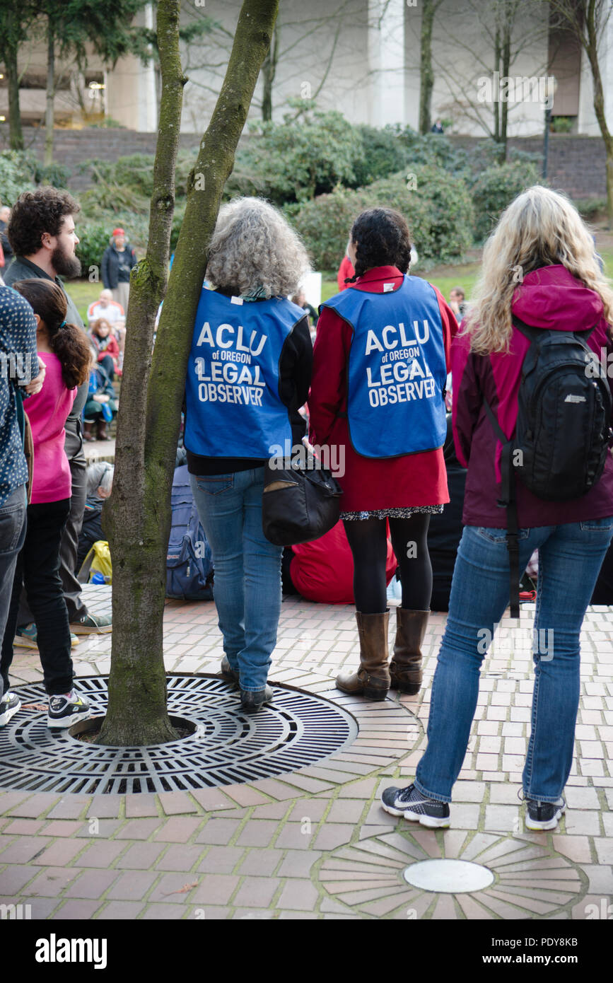 ACLU (American Civil Liberty Union) of Oregon legal observers at a Dakota Access Pipeline (DAPL) protest in the downtown Terry Shrunk Plaza park Stock Photo