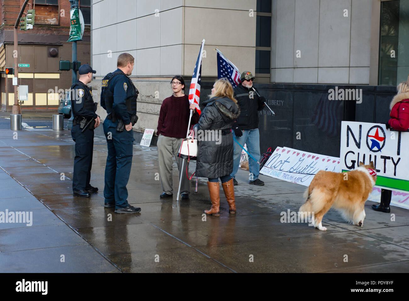David Fry and others protesting the second trial Malheur Wildlife Refuge occupation talking to police Stock Photo