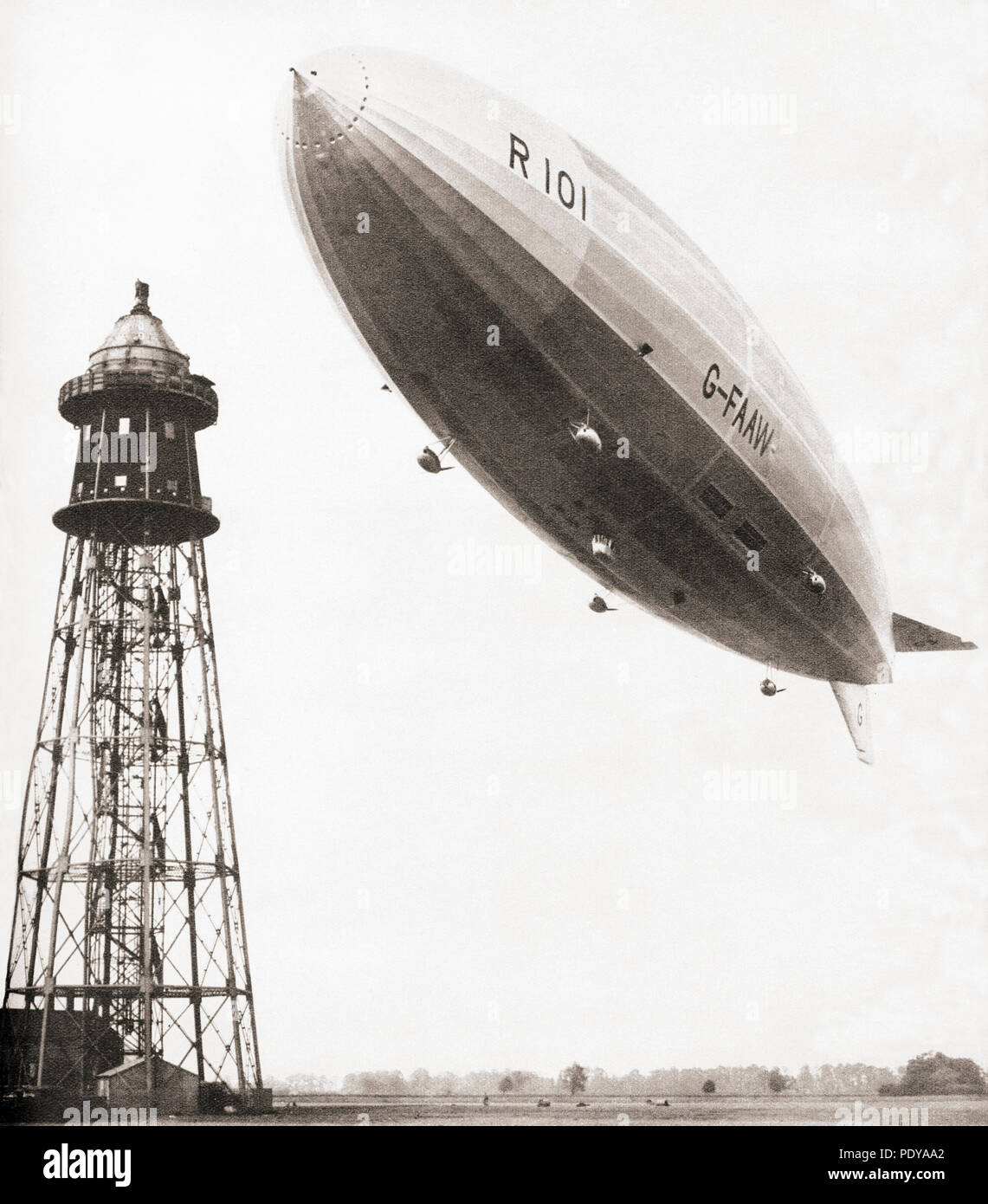 The final flight of the British rigid airship R101 which crashed during bad weather conditions over France in 1930.  48 of the 54 people aboard perished in the accident.  From These Tremendous Years, published 1938. Stock Photo