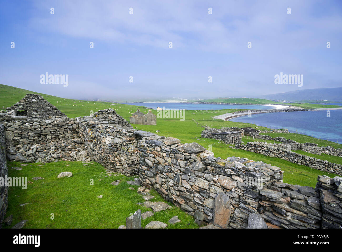 Ruins of abandoned farm buildings / croft house on the Kettla Ness peninsula on West Burra, Mainland, Shetland Islands, Scotland, UK Stock Photo