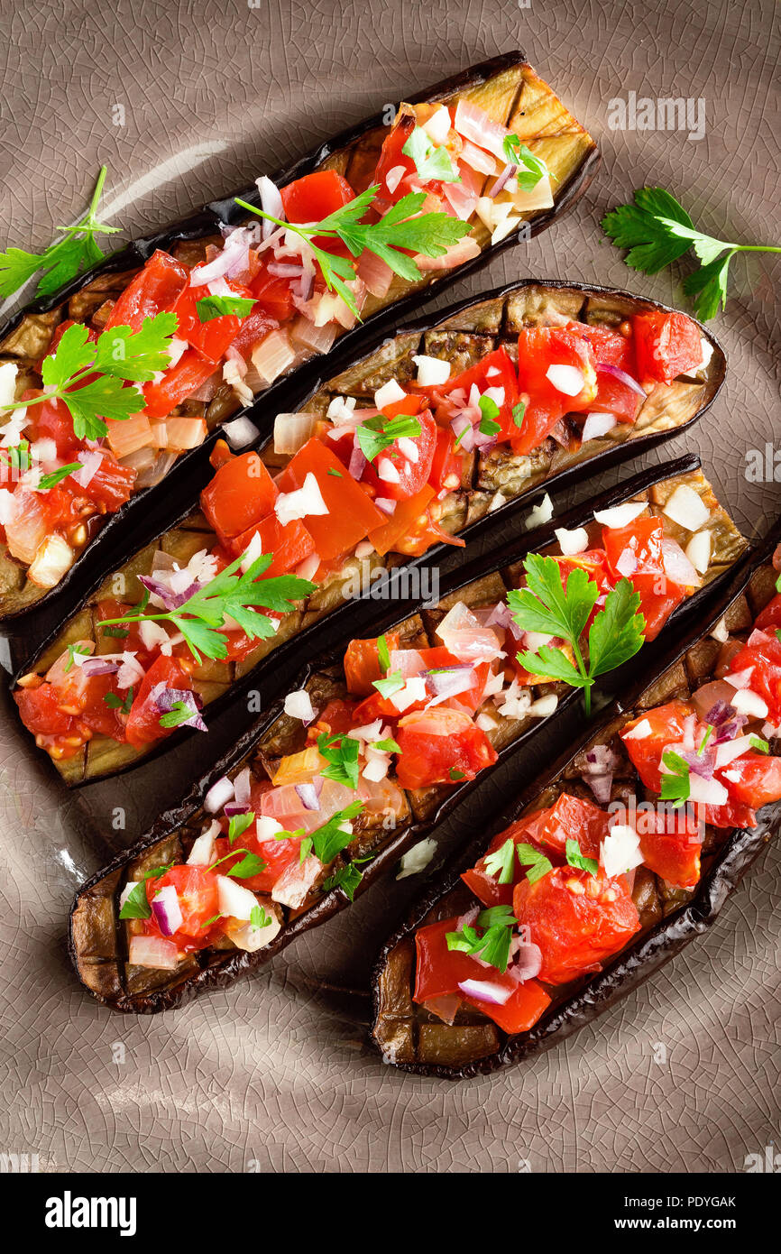 Baked eggplants with tomatoes, onion and garlic Stock Photo Alamy