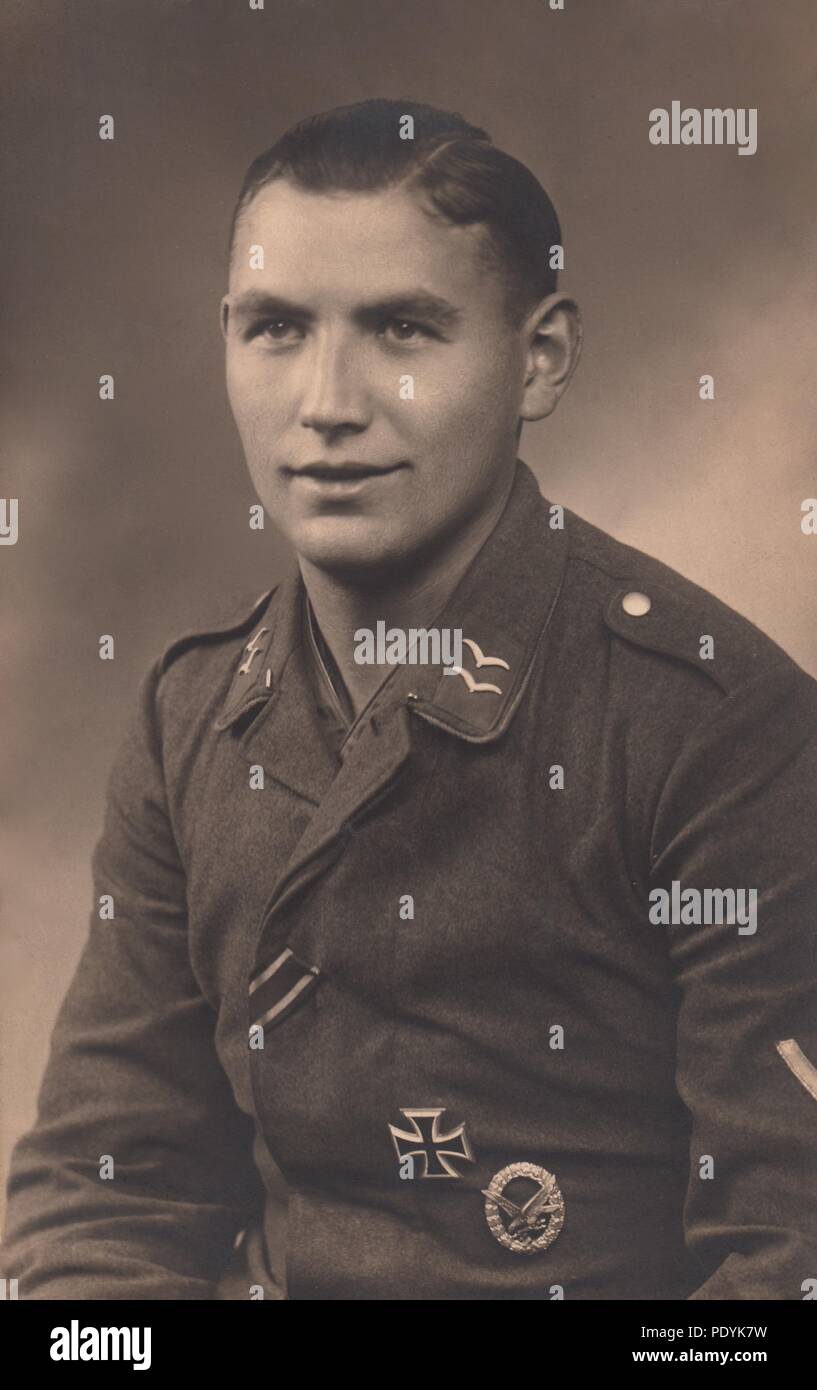 Image from the photo album of Feldwebel Willi Hoffmann of 5. Staffel, Kampfgeschwader 30: A very nice studio portrait of Gefreiter Willi Hoffmann of 5./KG 30, taken in late 1940. Hoffmann is wearing the ribbon to the Iron Cross 2nd Class, Air Gunner Badge and Iron Cross 1st Class. Will Hoffmann and his entire crew failed to return from a mission in the Mediterranean on 23rd January 1943. Stock Photo