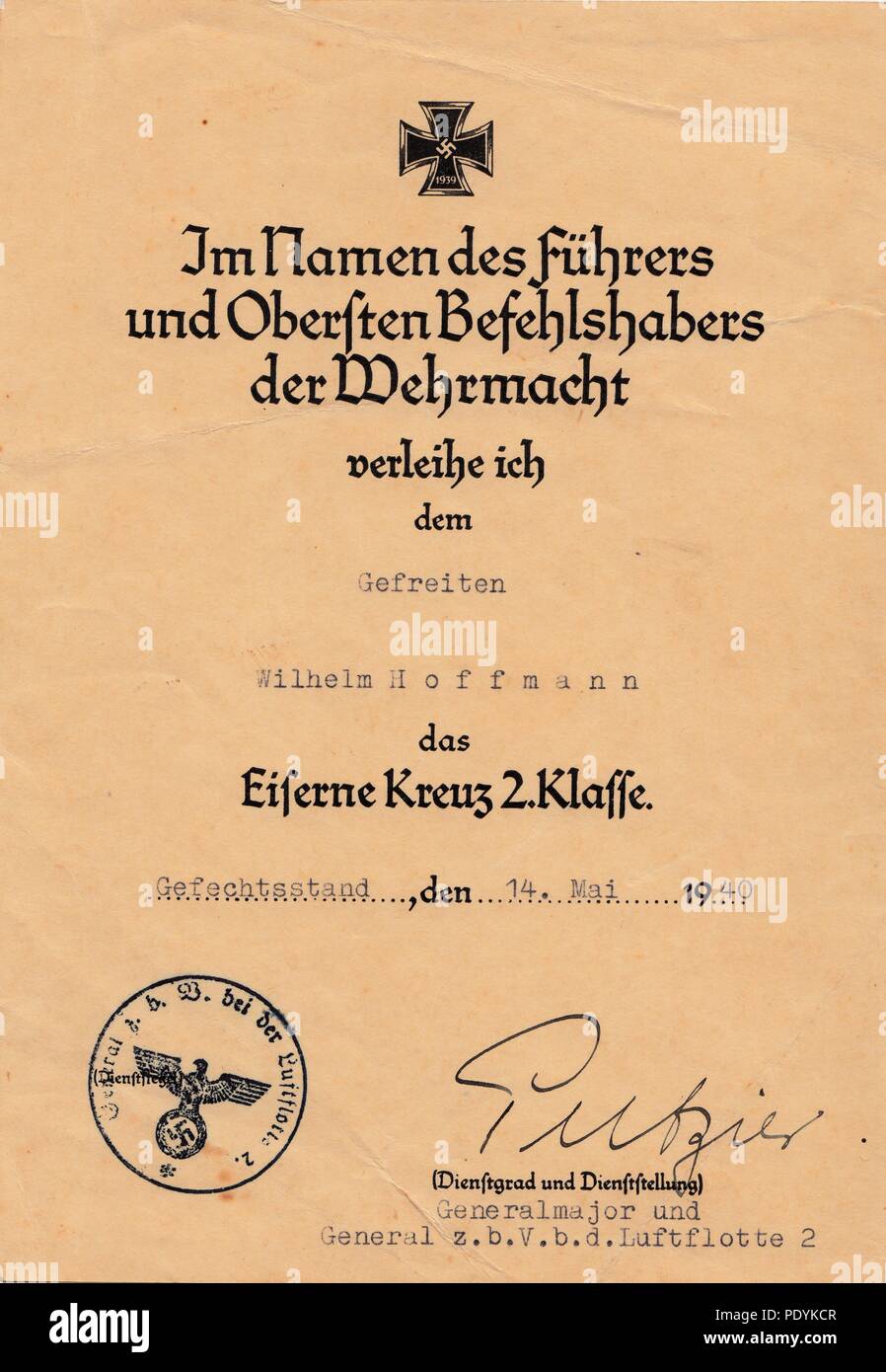 Certificate awarded to Feldwebel Willi Hoffmann of 5. Staffel, Kampfgeschwader 30: Certificate for the Iron Cross 2nd Class, awarded to Gefreiter Willi Hoffmann of 5./KG 30 on 14th May 1940. it is signed in ink by Generalmajor Richard Putzier, General for Special Duties in Luftflotte 2. Stock Photo