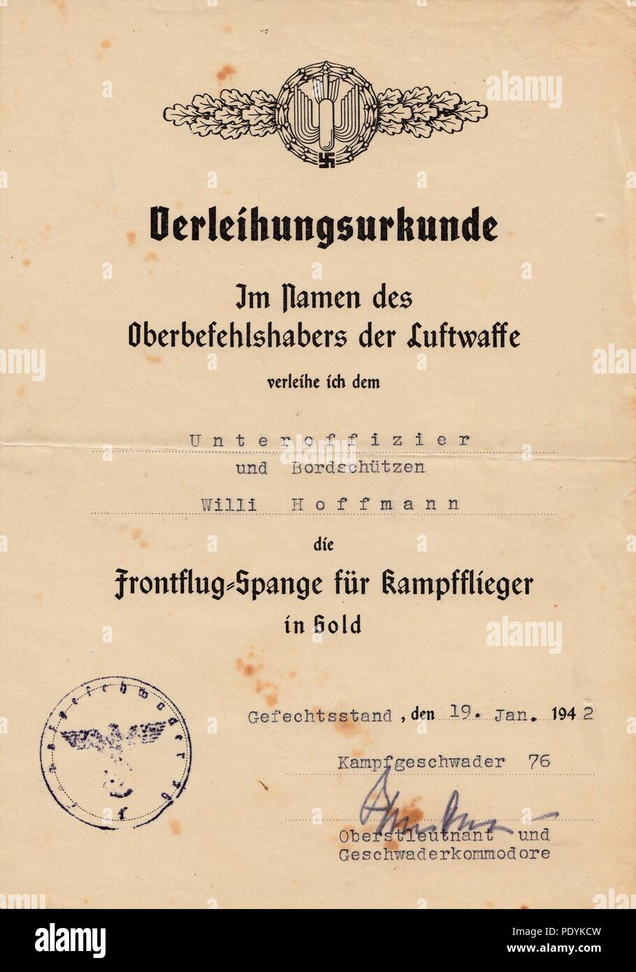 Certificate awarded to Feldwebel Willi Hoffmann of 5. Staffel, Kampfgeschwader 30: Certificate for the Bomber Clasp in Gold awarded to  Unteroffizier Willi Hoffmann of 5./KG 30 on 19th January 1942. it is signed in ink by Oberstleutnant Ernst Bormann, Geschwaderkommodore Kampfgeschwader 76. Stock Photo