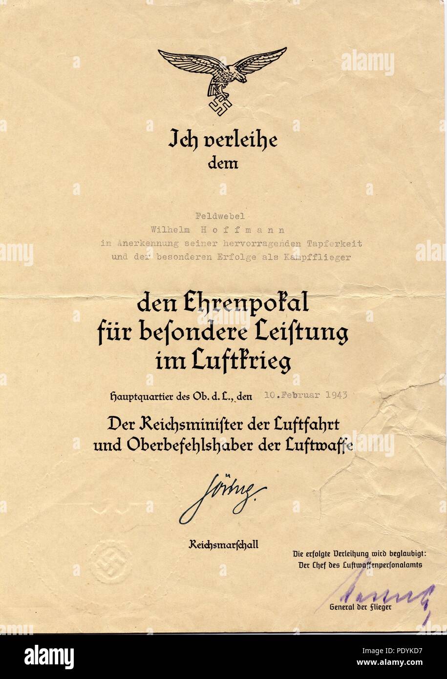 Certificate awarded to Feldwebel Willi Hoffmann of 5. Staffel, Kampfgeschwader 30: Certificate for the Goblet of Honour, awarded posthumously to Willi Hoffmann on 10th February 1943. It is facsimile signed by Hermann Göring and signed in crayon by General der Flieger Gustav Kastner-Kirdorf, Chef des Luftwaffenpersonalamts (Head of the Air Force Personnel Office). Willi Hoffmann and his crew failed to return from a mission in the Mediterranean on 23rd January 1943. Stock Photo