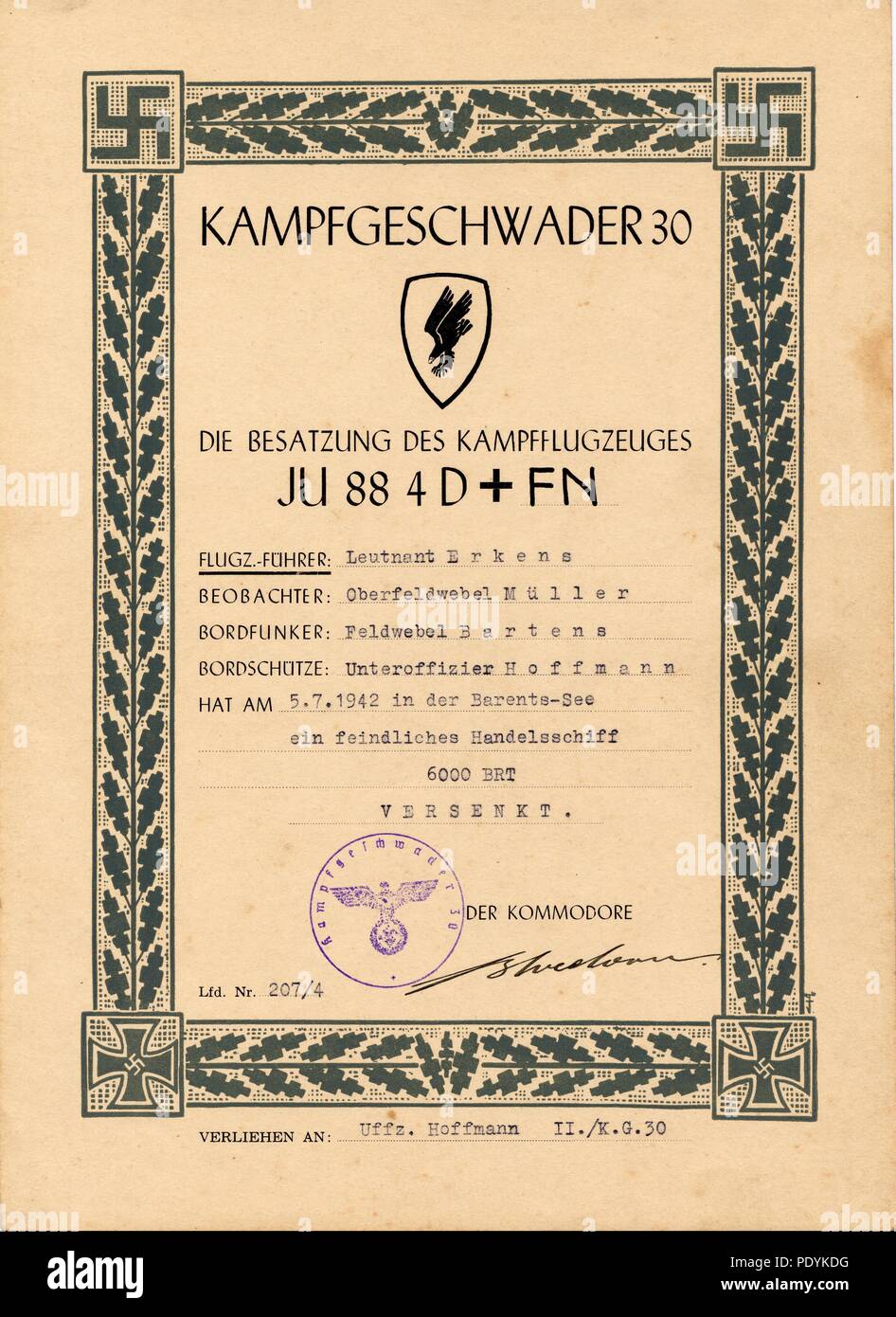 Certificate awarded to Feldwebel Willi Hoffmann of 5. Staffel, Kampfgeschwader 30: Awarded by KG 30 to Leutnant Willi Erkens (Pilot), Oberfeldwebel Richard Müller (Observer), Feldwebel Bartens (Radio Operator) and Unteroffizier Willi Hoffmann (Air Gunner) of 5./KG 30 for sinking an enemy merchant ship in the Barents Sea on 5th July 1942, while crewing Junkers Ju 88 4D+FN. The document is signed in ink by Major Erich Bloedorn, Kommodore of Kampfgeschwader 30. The date coincides with a day of devastating attacks on Allied convoy PQ17 and may relate to the MV Peter Kerr. Stock Photo