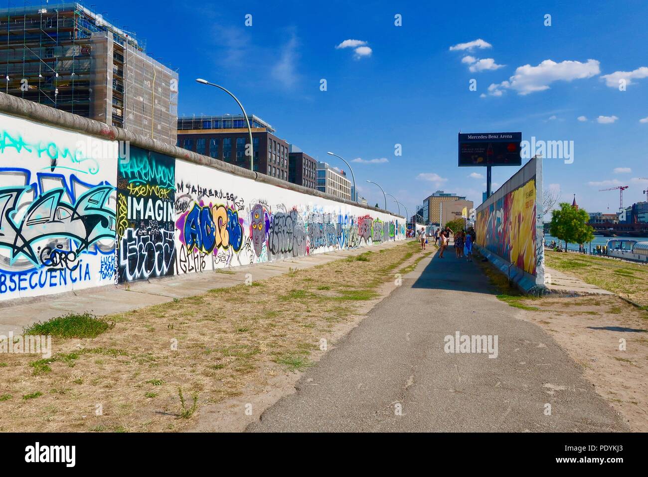 East Side Gallery Friedrichshain, Berlin. Painted and graffitied remains of the Berlin Wall, Germany. Hot summer afternoon in August 2018. Stock Photo