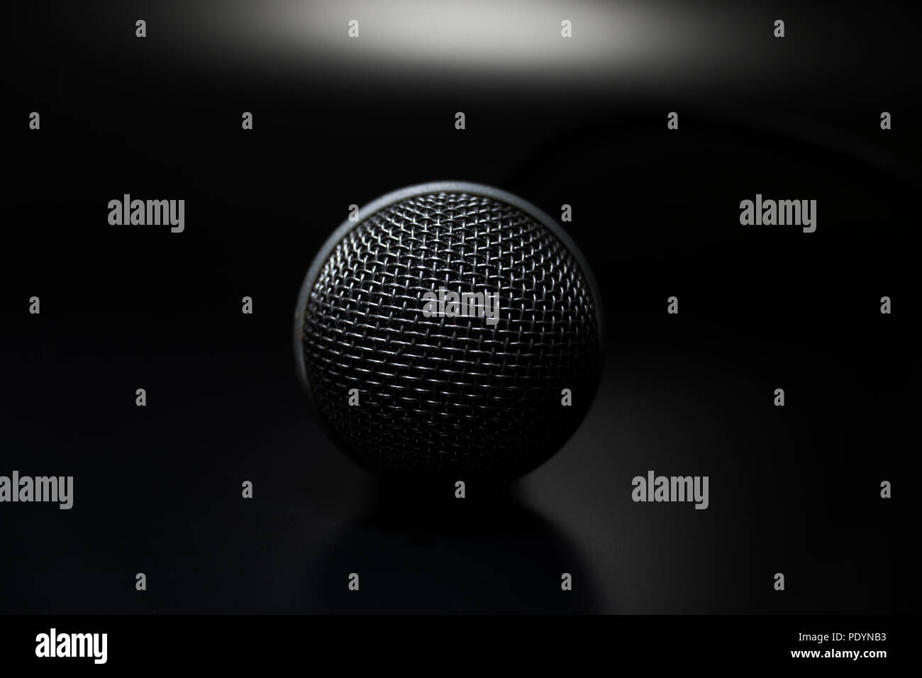 Musical Instrument close up. Mic of a band singer on black background