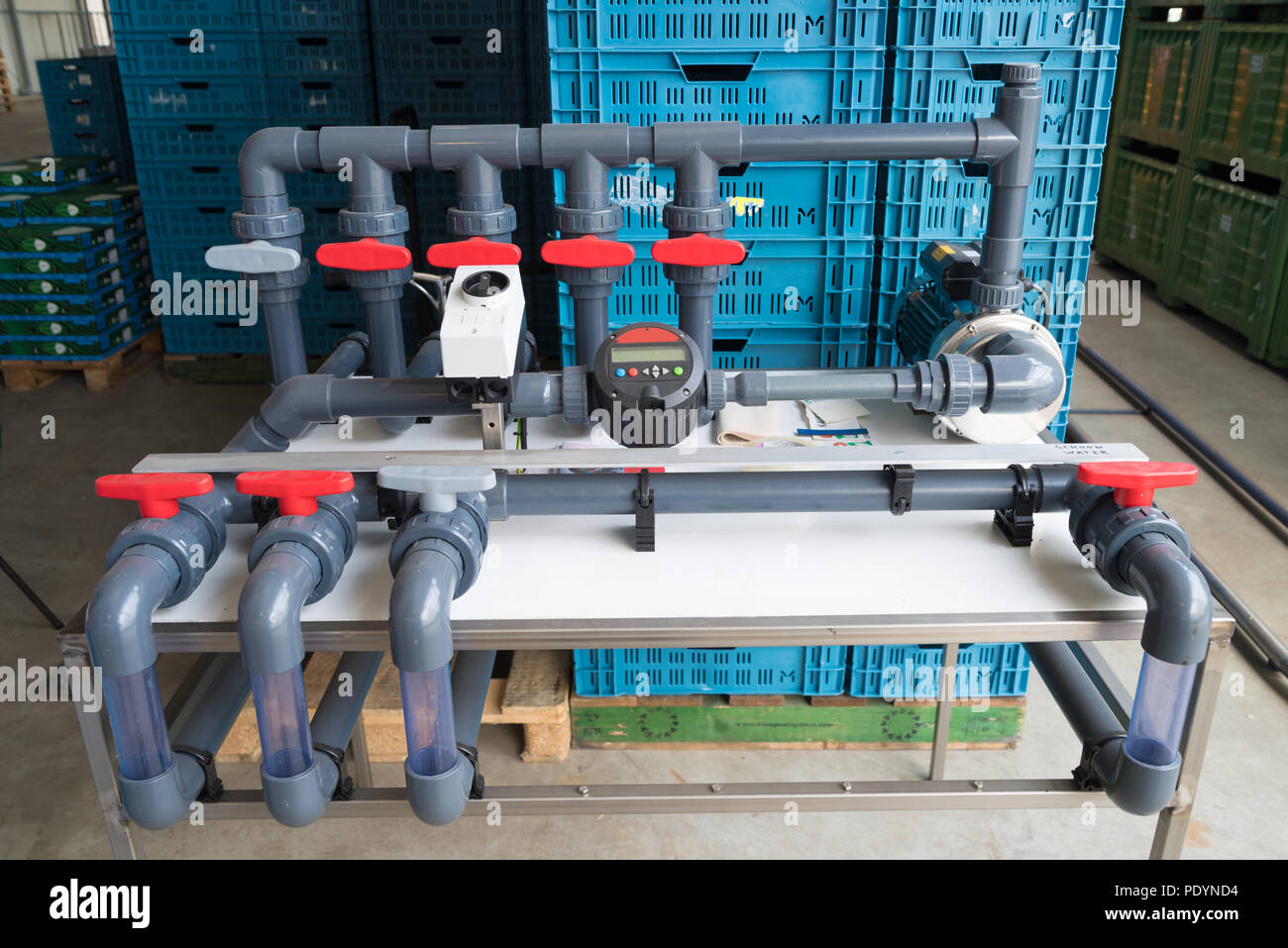 automated irrigation system with flow meter in a dutch greenhouse Stock