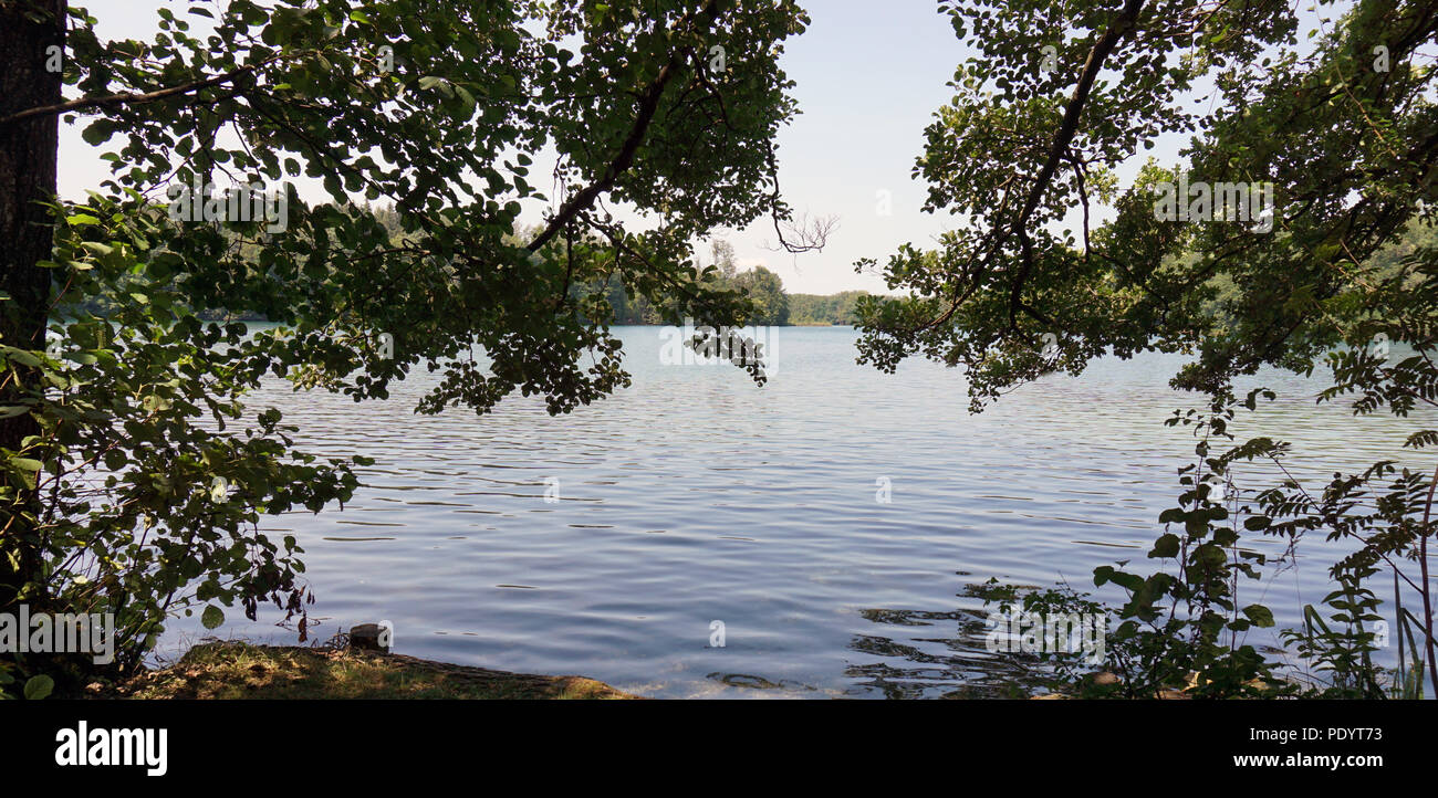 lonely mountain lake in a wood Stock Photo