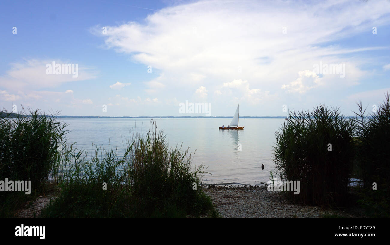 lonely sailing boat Stock Photo