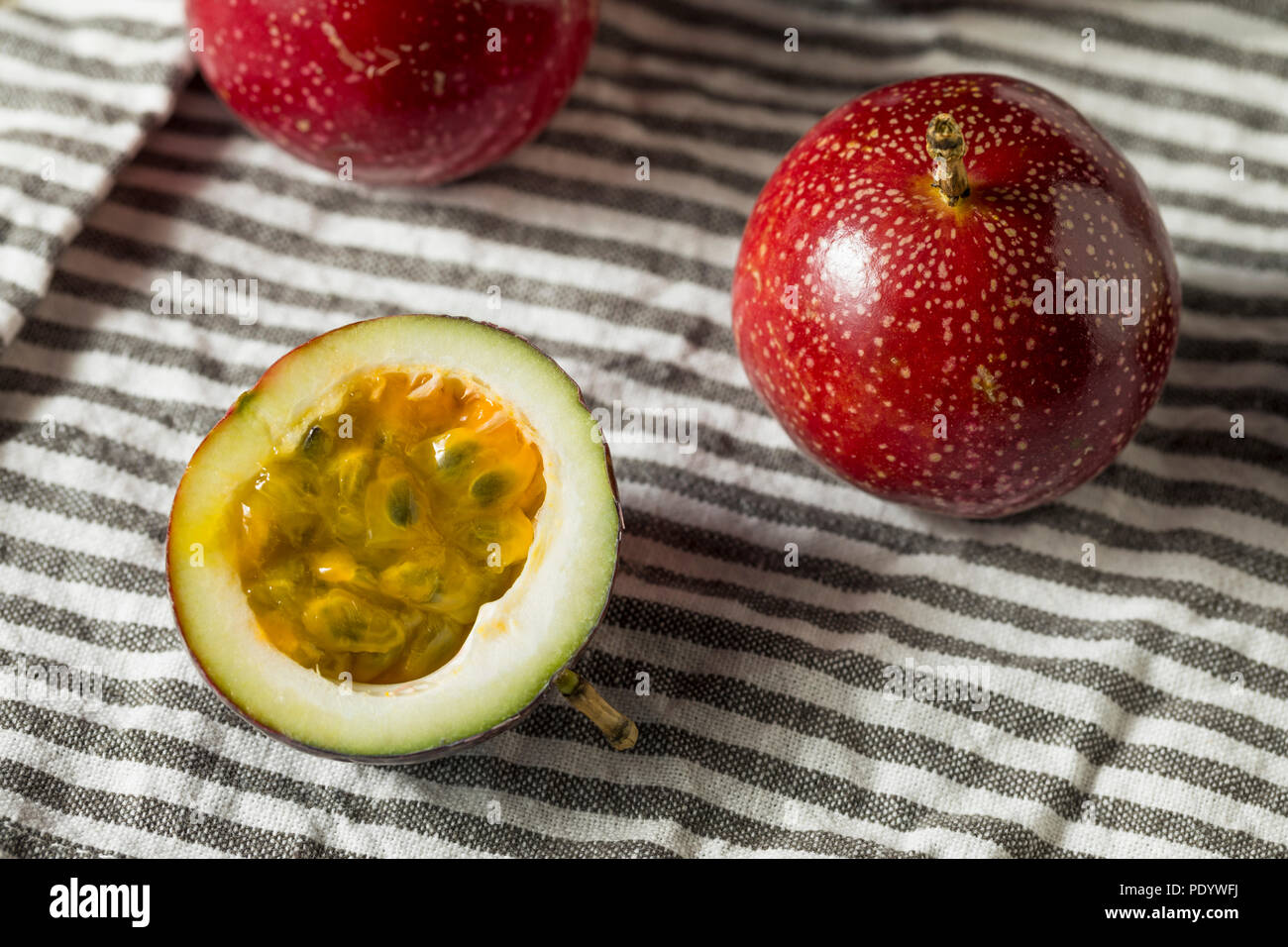 Red Organic Raw Passion Fruit Ready to Eat Stock Photo Alamy