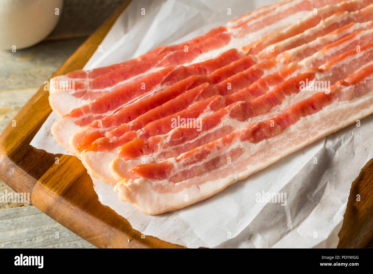 Raw Grass fed Bacon Strips Ready to Cook Stock Photo