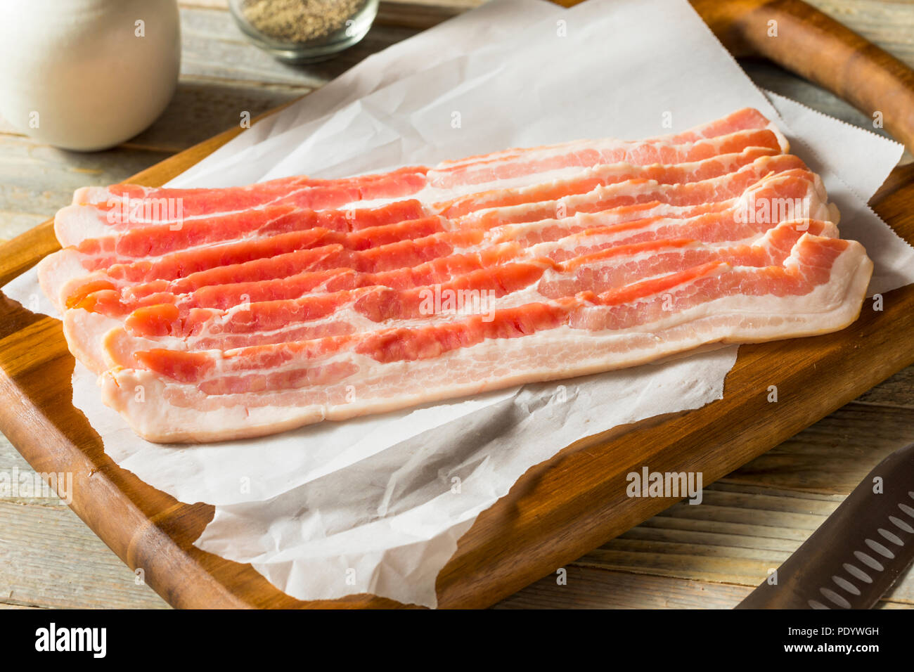 Raw Grass fed Bacon Strips Ready to Cook Stock Photo