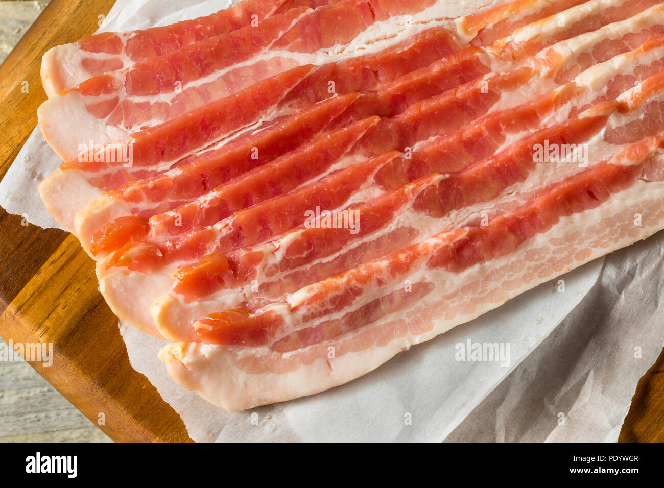 Raw Grass fed Bacon Strips Ready to Cook Stock Photo