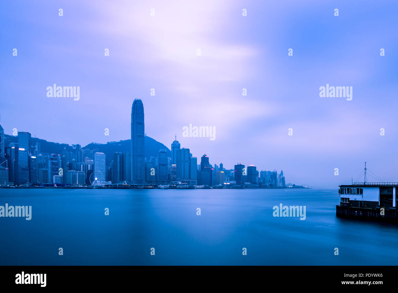 Victoria Harbour of Hong Kong in cloudy day Stock Photo - Alamy