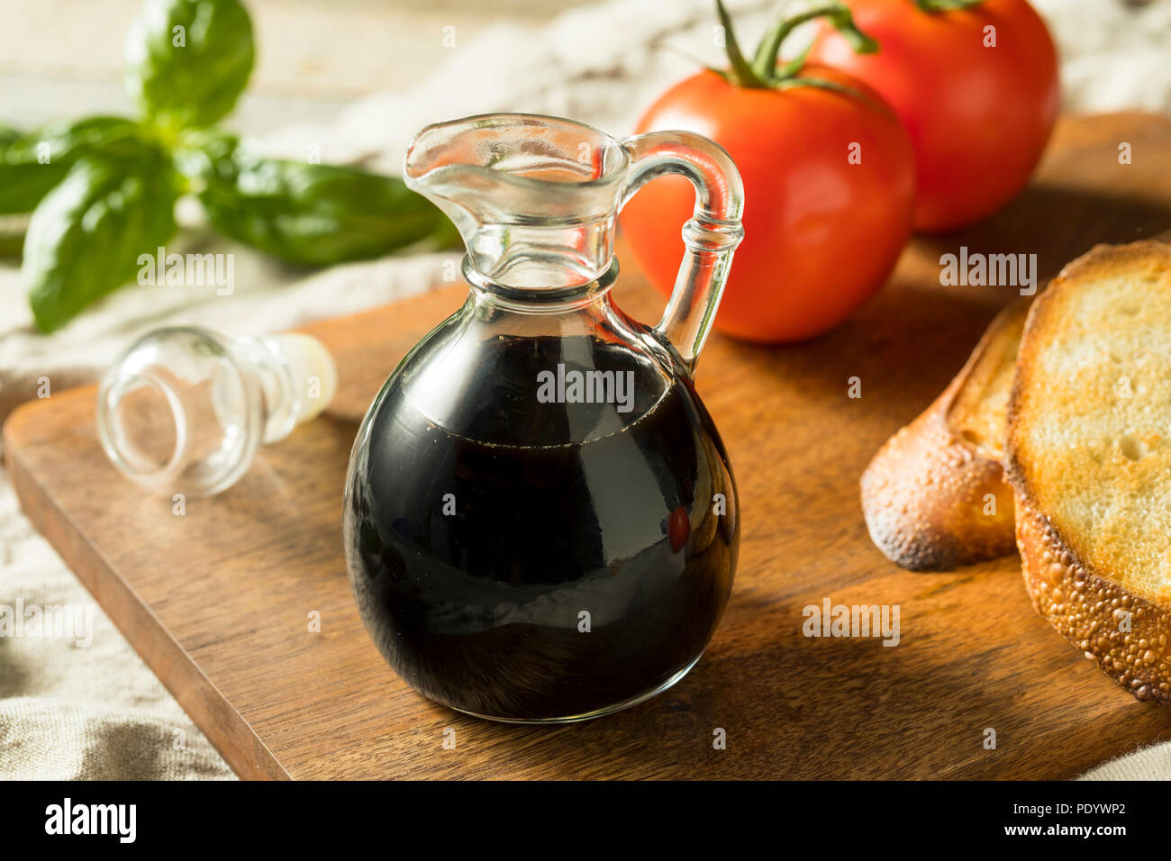 Organic Black Balsamic Vinegar in a Bottle Stock Photo