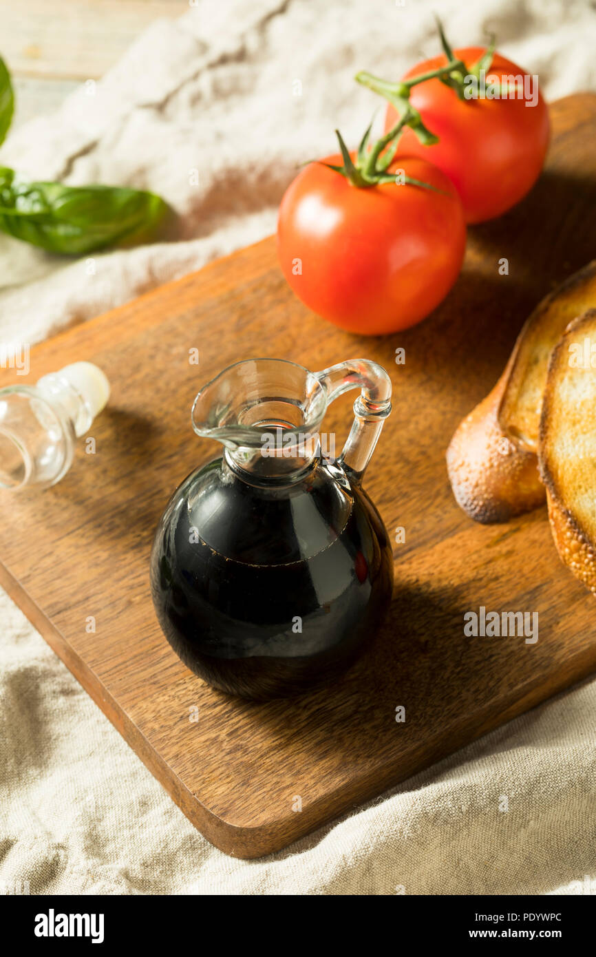 Organic Black Balsamic Vinegar in a Bottle Stock Photo