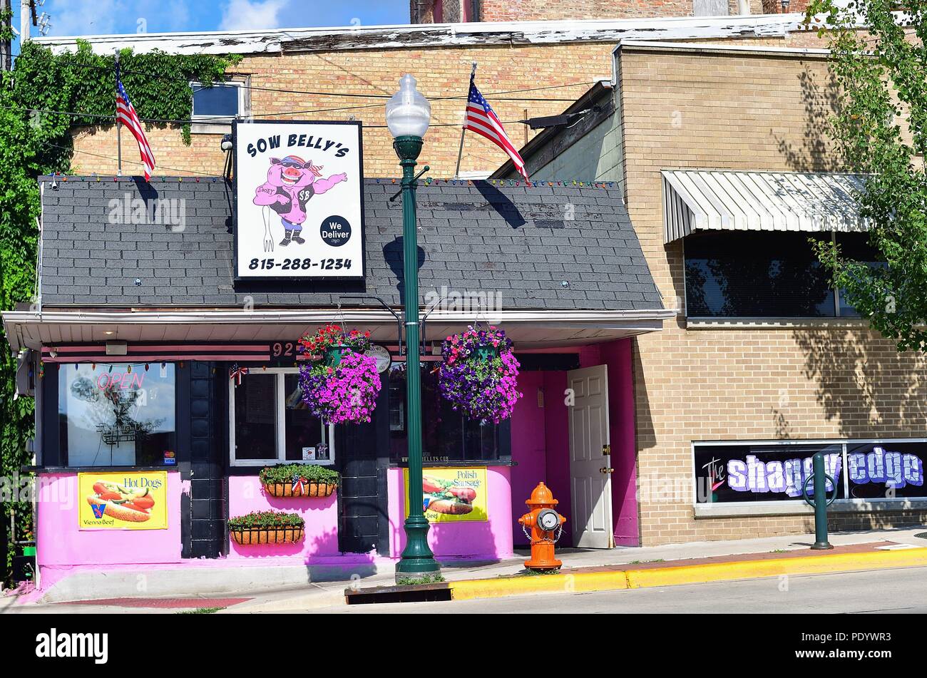 Dixon, Illinois, USA. A colorful corner hot dog stand in downtown Dixon, Illinois. Stock Photo