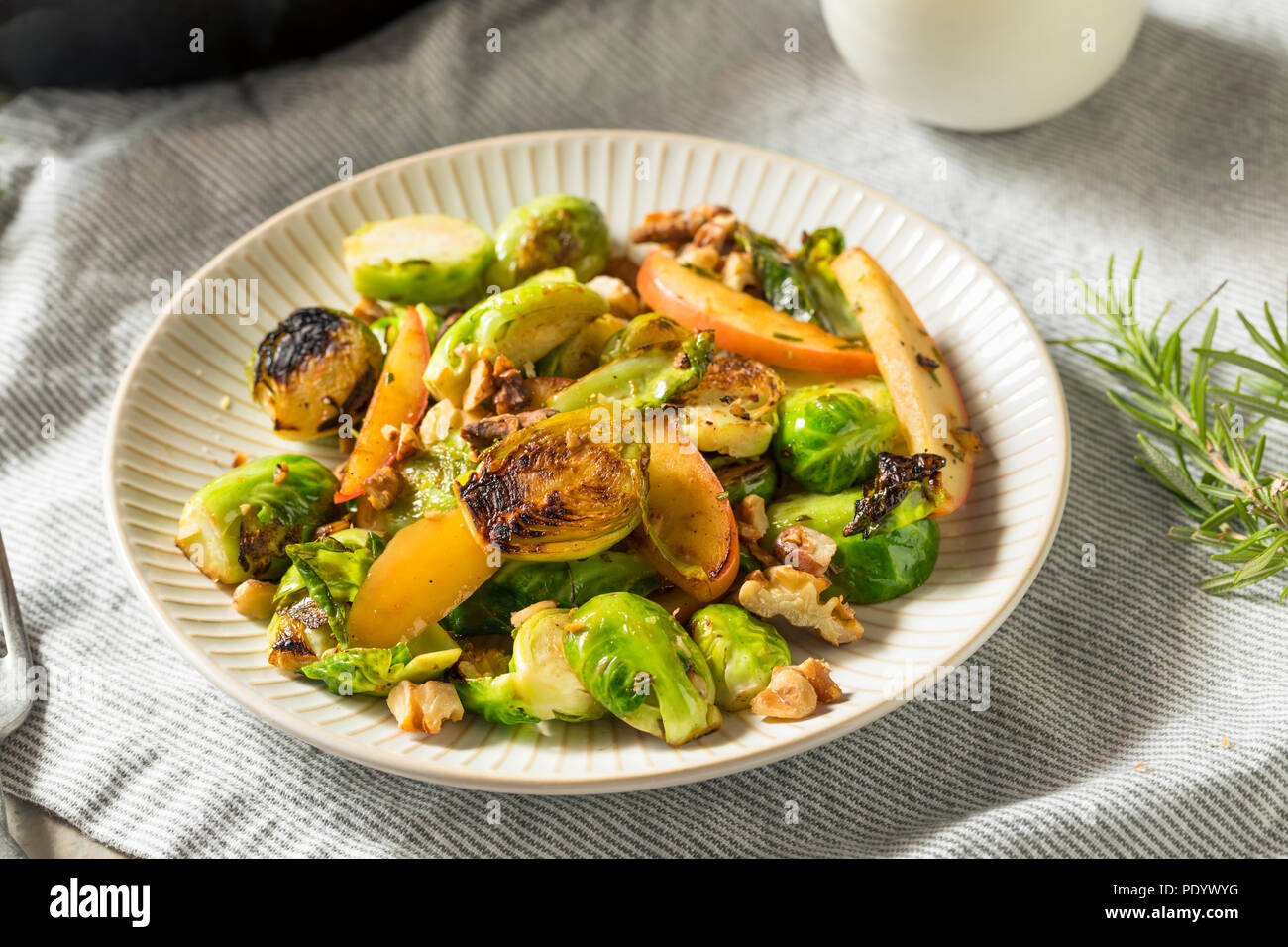 Homemade Brussel Sprout and Apple Salad for the Fall Stock Photo