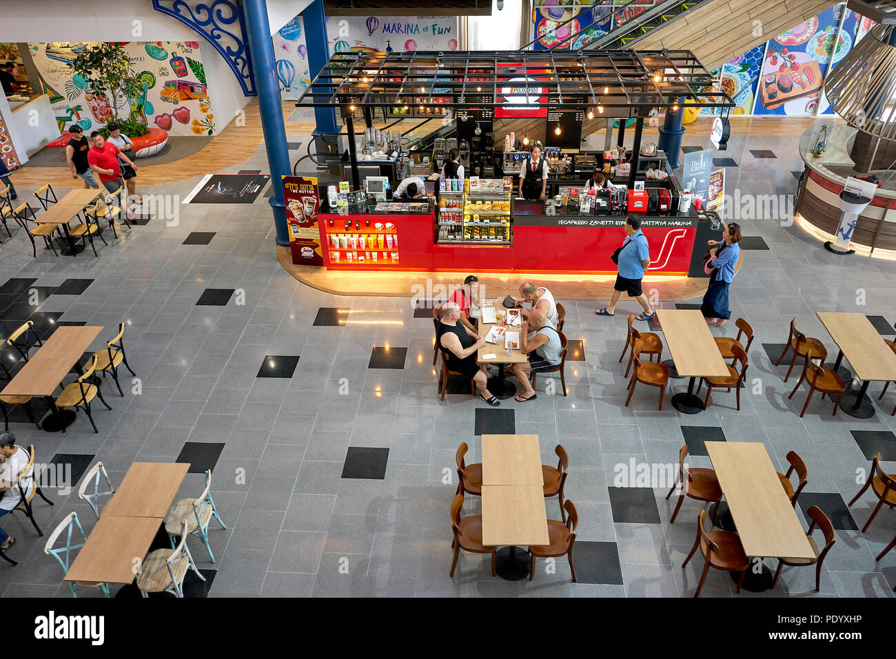 Overhead view of the restaurant dining area in a Thailand shopping mall. Diners from above. Southeast Asia. Stock Photo