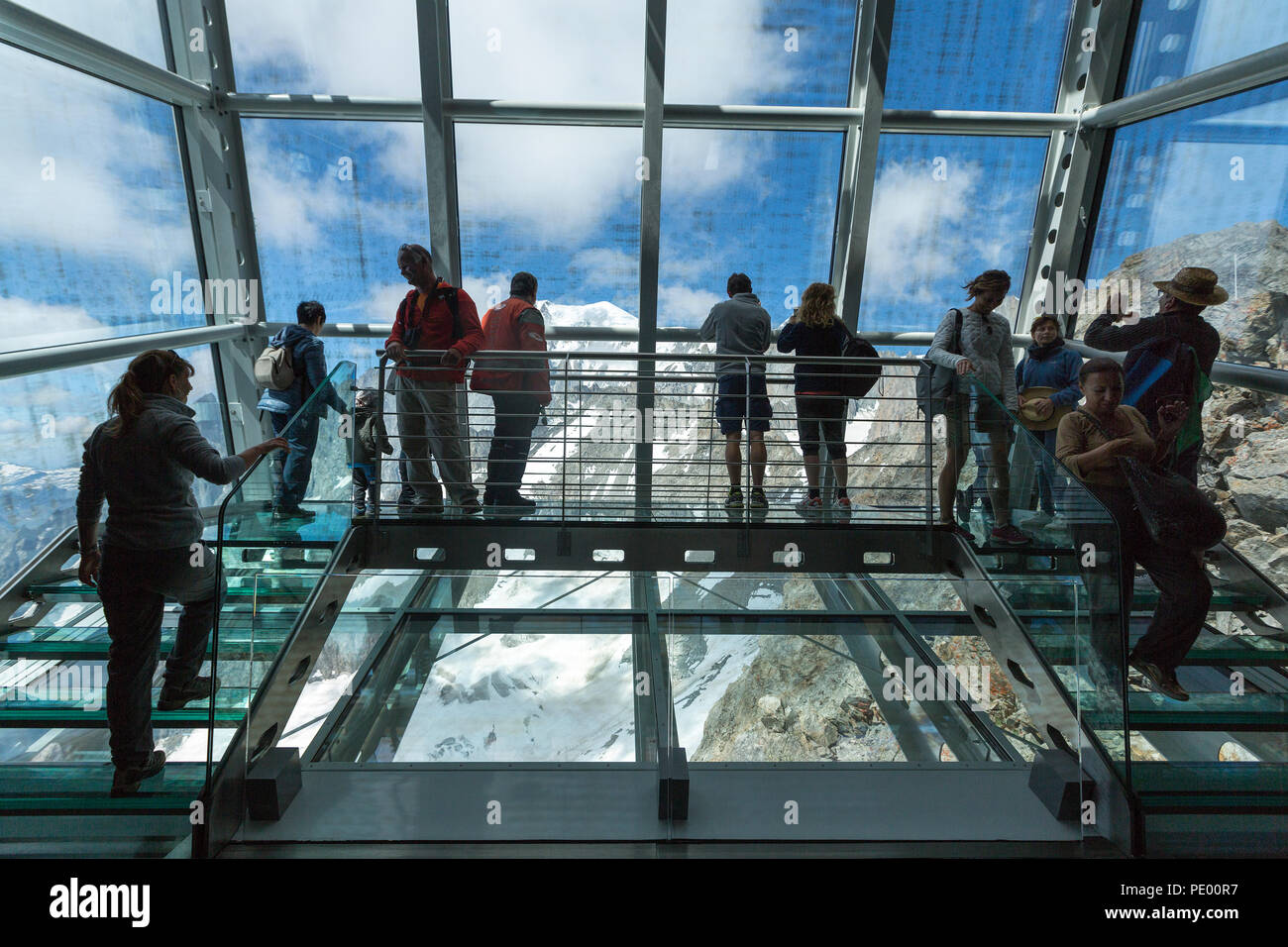 COURMAYEUR, ITALY, AUGUST 2: People enjoying the panoramic window called  Skywow, interior of Punta Helbronner, view of Monte Bianco (Mont Blanc)  massi Stock Photo - Alamy