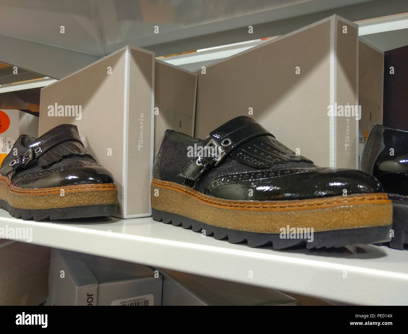 Shoes of the brand Tamaris displayed on shelf in shoe store Stock Photo -  Alamy