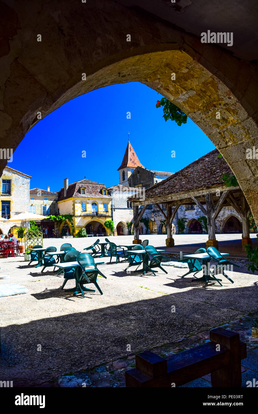 Central square in the medieval bastide village of Monpazier in the Dordogne region of France Stock Photo
