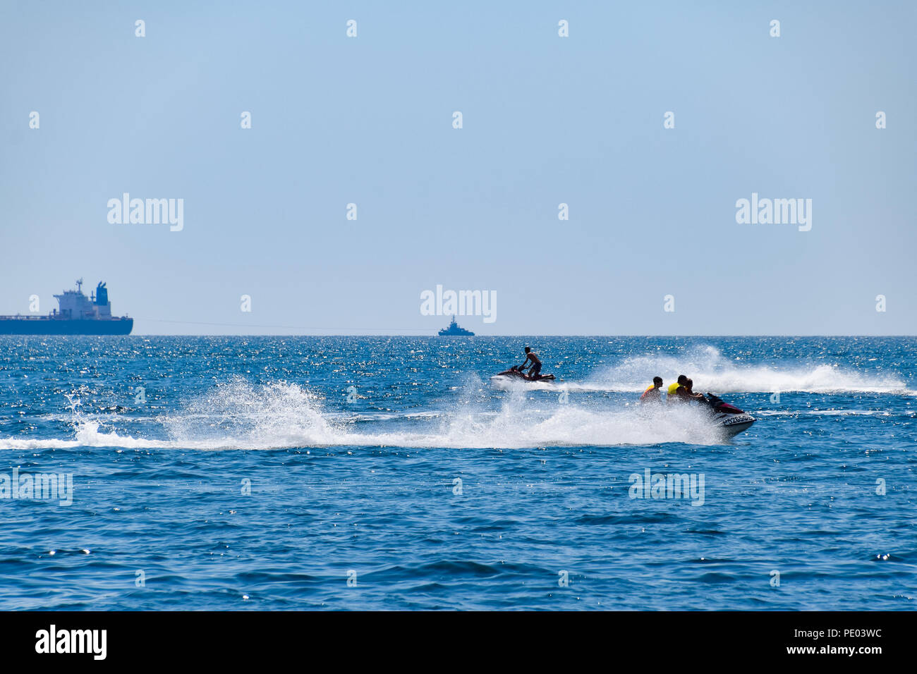 Novorossiysk, Russia - August 06, 2018: Motor transport in the sea, cutter, hydrosculator and boat. Stock Photo