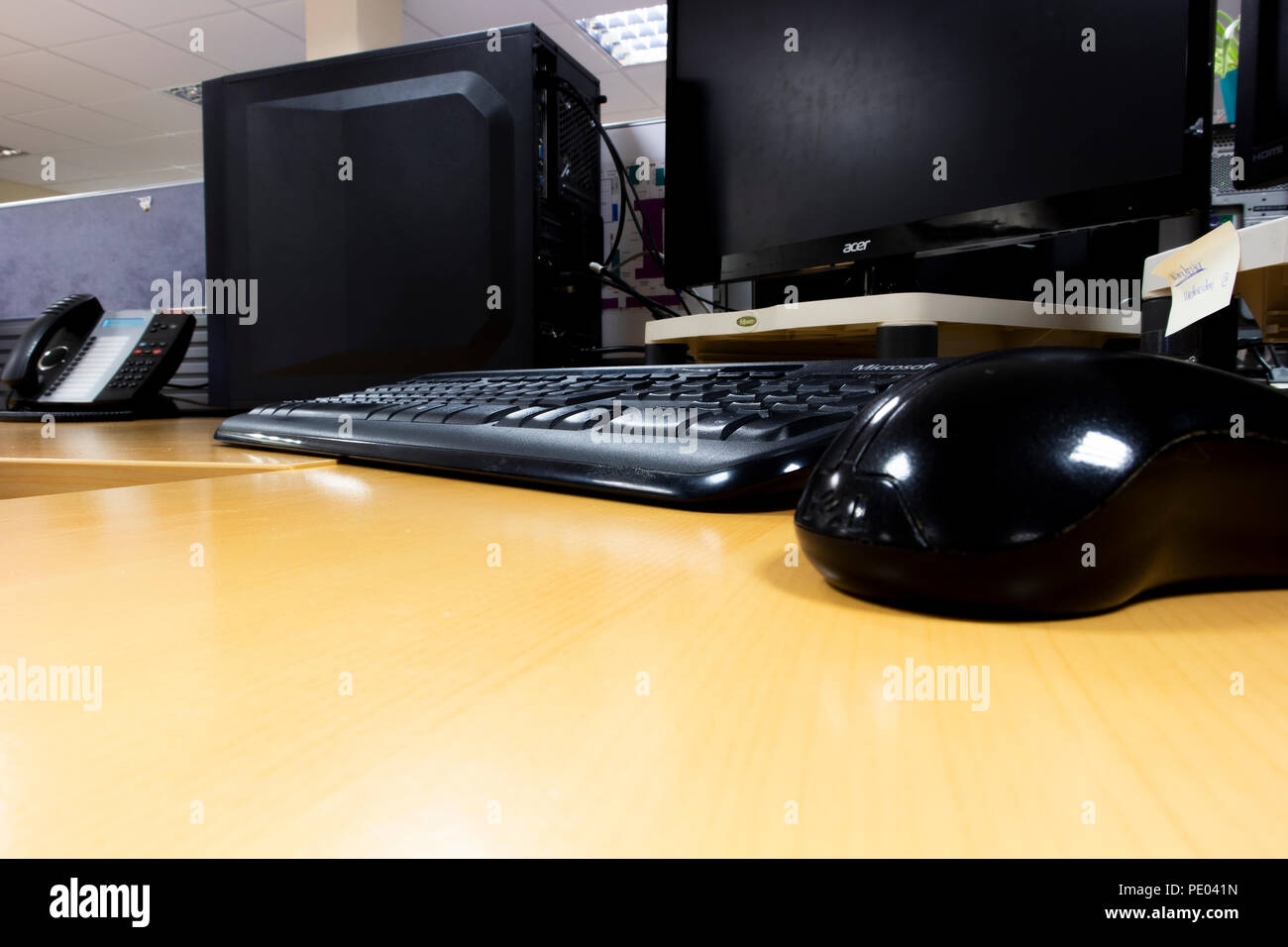 business desk office interior with mouse and keyboard to computer