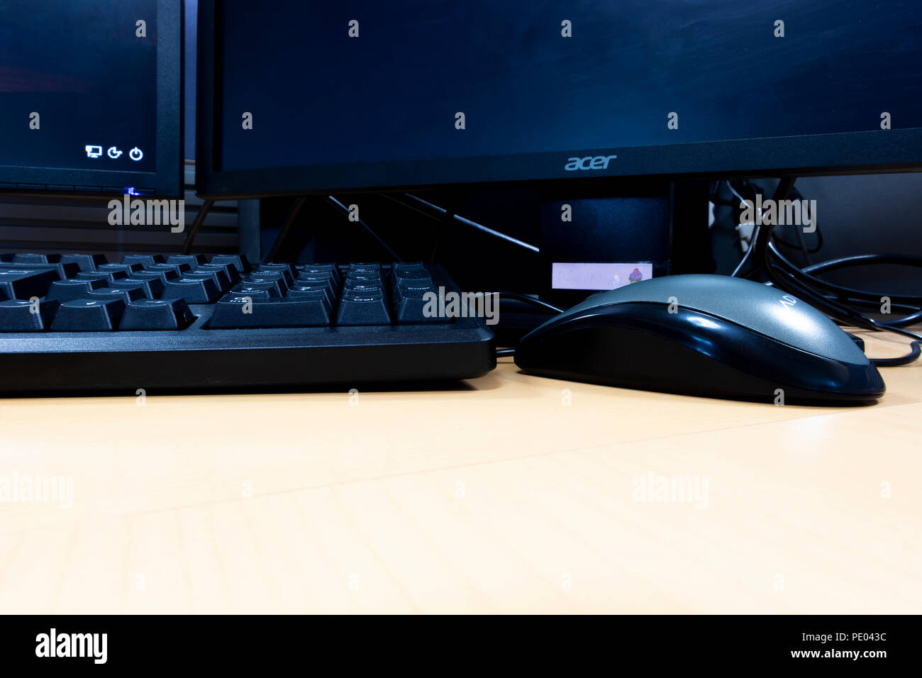 business desk office interior with mouse and keyboard to computer