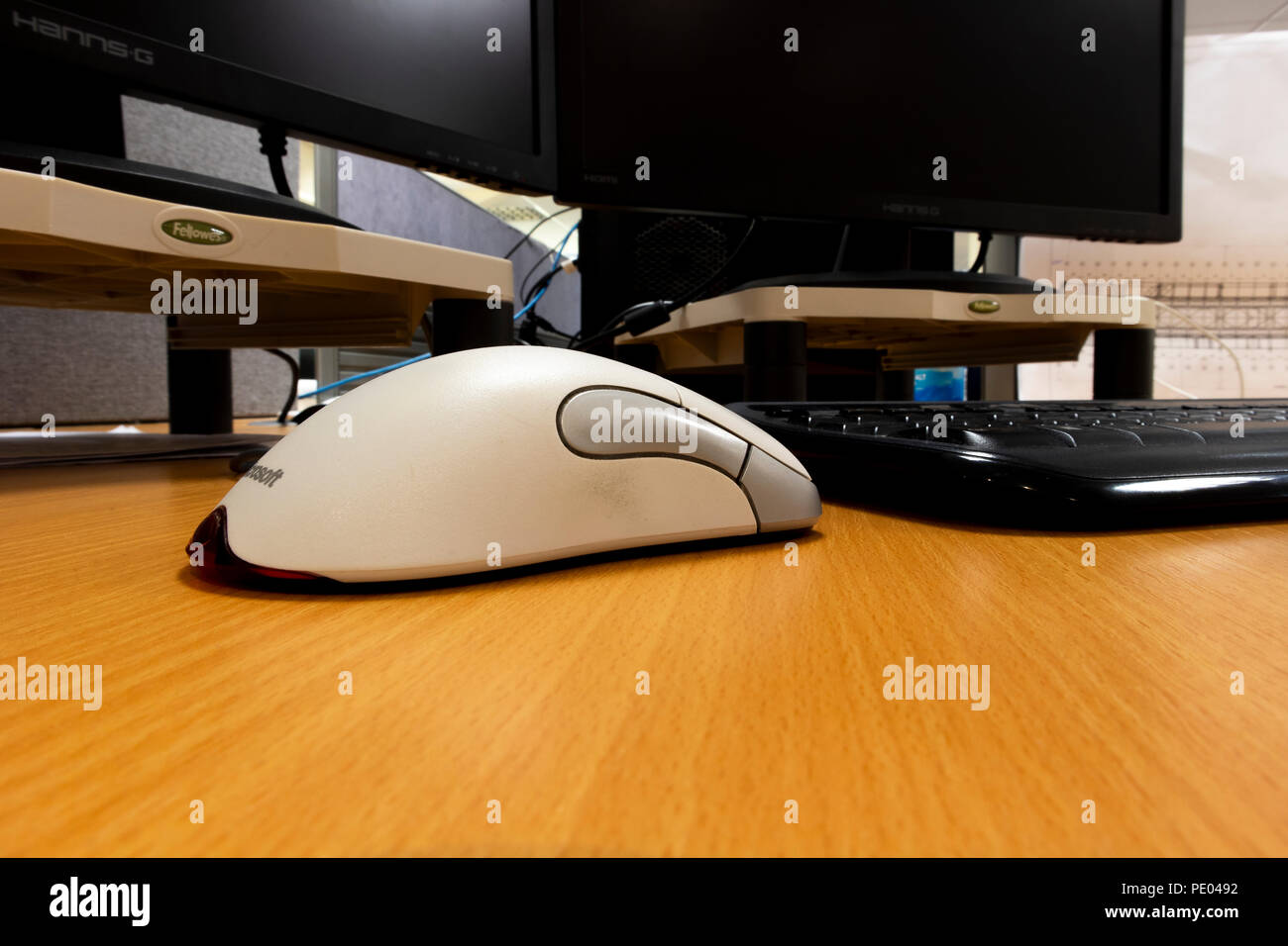 business desk office interior with mouse and keyboard to computer
