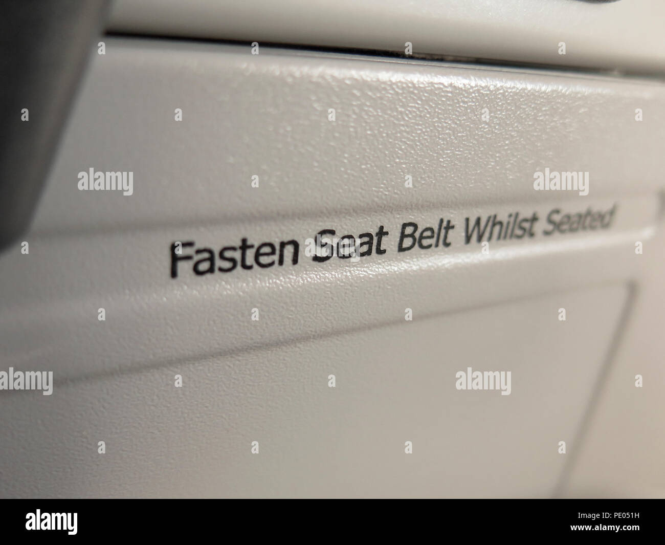 Airplane seatbelt hi-res stock photography and images - Alamy