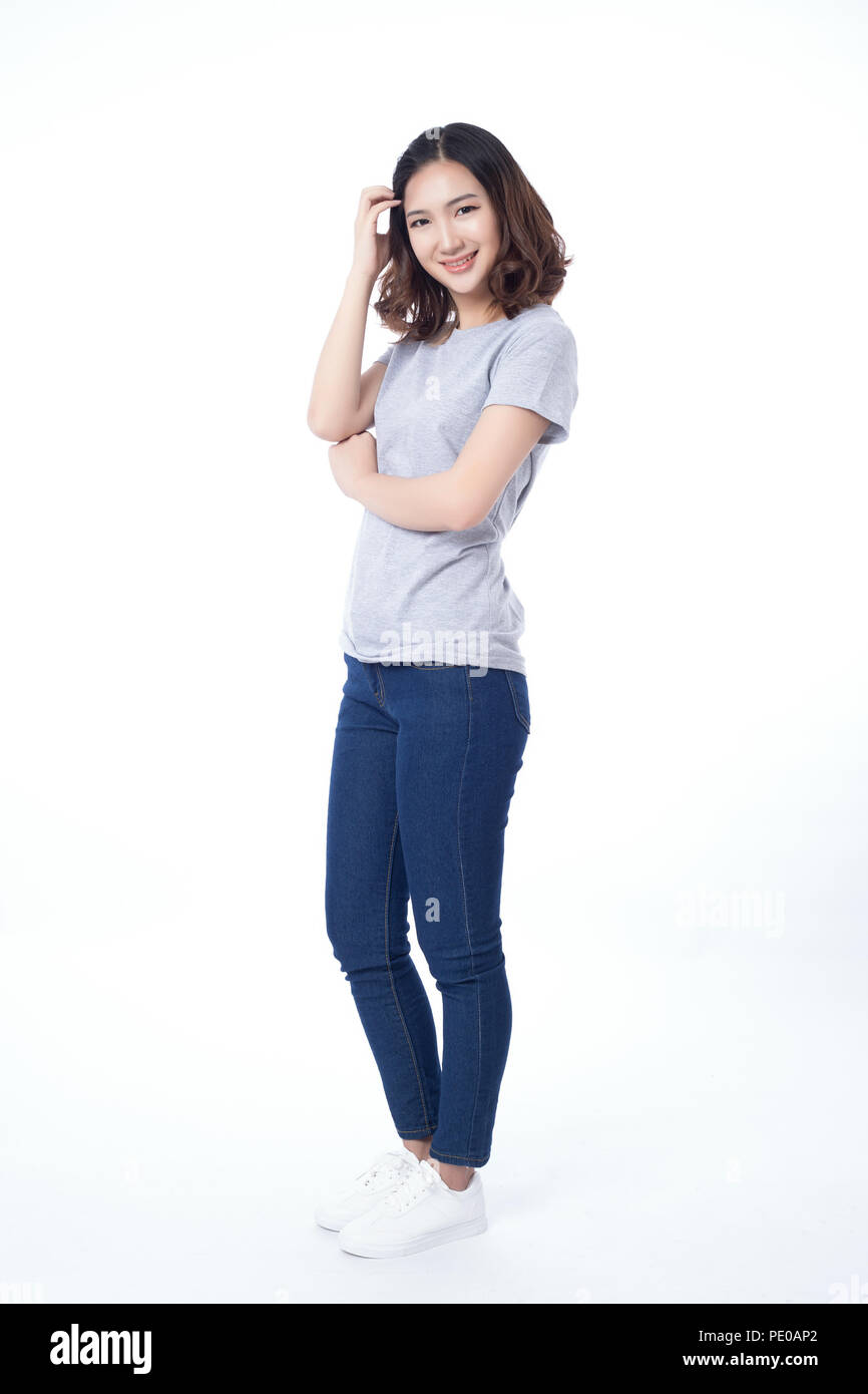Alluring Young Woman In White T Shirt And Blue Jeans Posing Over White Background Stock Photo Alamy Alluring Young Woman In White T Shirt And Blue Jeans Posing Over White Background Stock Photo Alamy