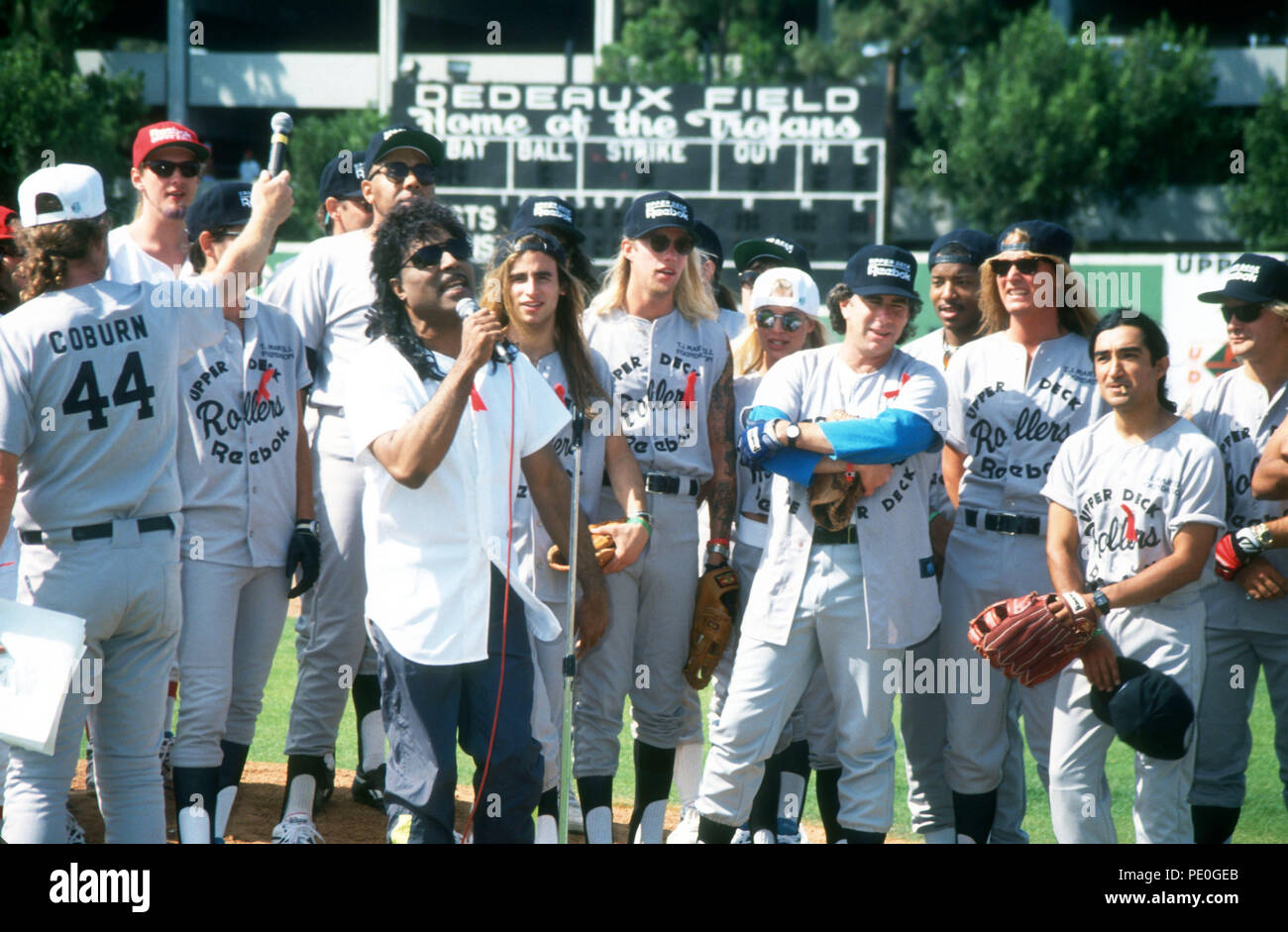 LOS ANGELES, CA - JUNE 14: Musician Layne Staley of Alice in Chains, Singer Little Richard and Jani Lane, rapper Young MC attend T.J. Martell Benefit Baseball Game on June 14, 1992 at Dedeaux Field in Los Angeles, California. Photo by Barry King/Alamy Stock Photo Stock Photo