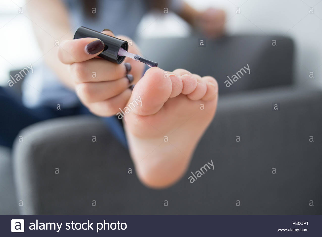Girl Sit On Couch Paint Nail Polish Stock Photo 215142761 Alamy