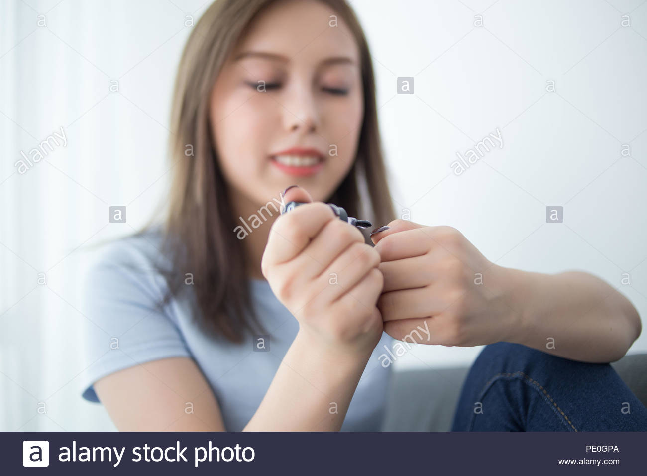 Girl Sit On Couch Paint Nail Polish Stock Photo 215142770 Alamy