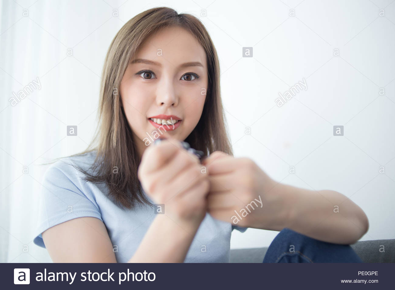 Girl Sit On Couch Paint Nail Polish Stock Photo 215142774 Alamy