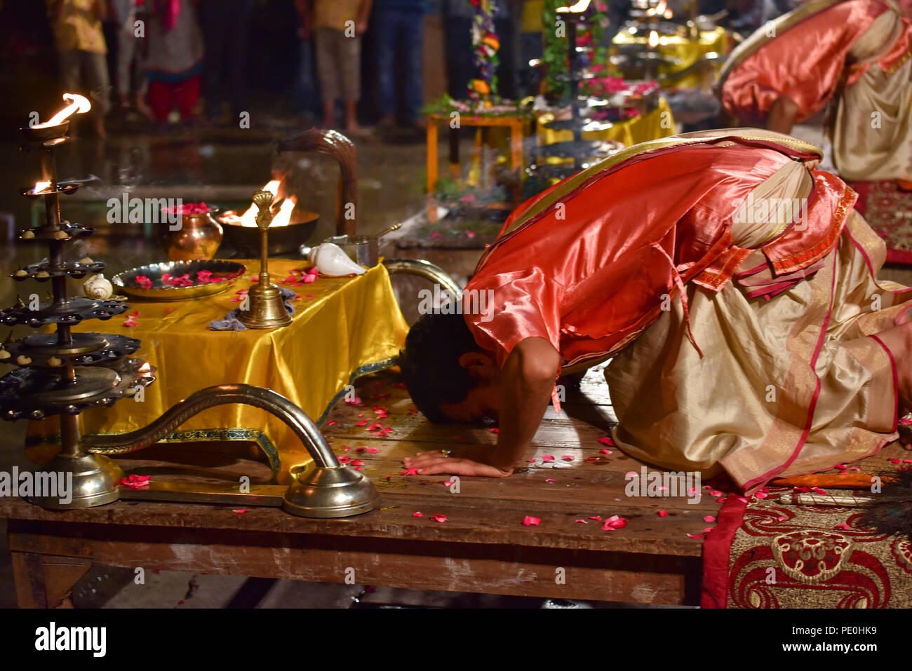 Hindu priests performing evening Ganga Aarti ceremony, Dashashwamedh ghat, Varanasi, India Stock Photo